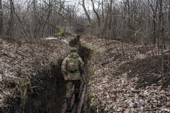 A Ukrainian soldier walks on the frontline in Zolote, Ukraine. A build-up of Russian troops along the border with Ukraine has heightened worries that Russia intends to invade the Donbas region, held mostly by separatists.