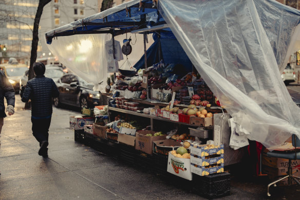 A fruit stand in front of Sotheby’s in Manhattan, where a banana that became part of a $US5.2 million piece of art was sold.