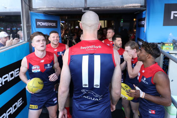 Max Gawn leads the Dees onto the field. 