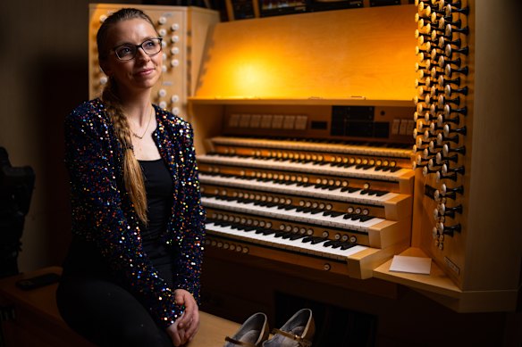 Anna Lapwood at the keyboard in the organ loft of the Sydney Opera House.