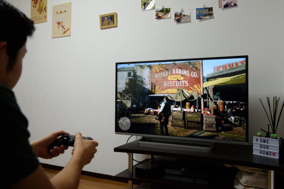Three friends each received a $1652 fine - a total penalty of almost $5000 - for playing video games in a lounge room.