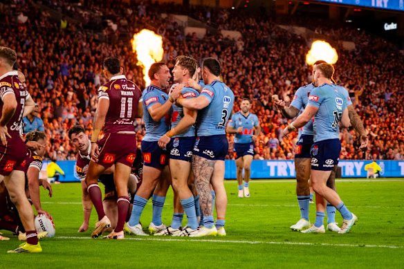 The Blues celebrate after Murray’s try.