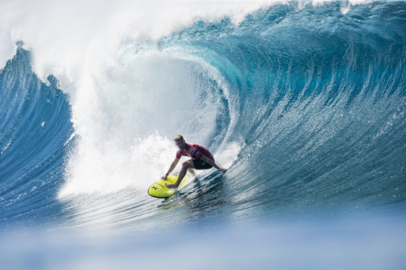 John John Florence taking on a wave.