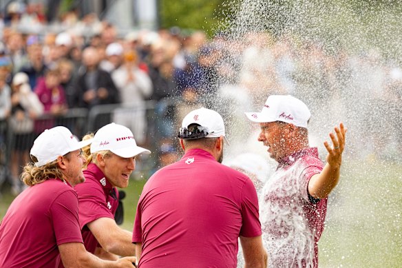 Australian Lucas Herbert is showered with champagne after his LIV Golf win in England last month.