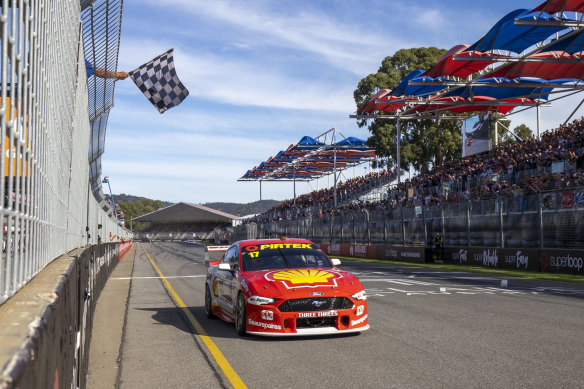 Scott McLaughlin gets the coveted chequered flag during race two of the Adelaide 500 on Sunday.