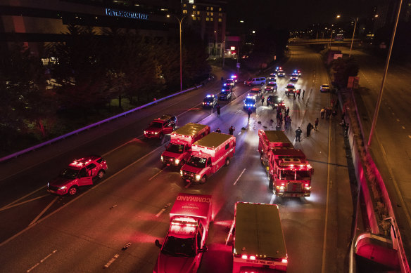 Emergency workers at the site of the incident on the Interstate 5 in Seattle.