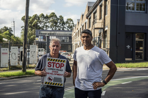 Colin Cranson and Rob Meyers protest Platino’s Lords Road proposal in 2018.