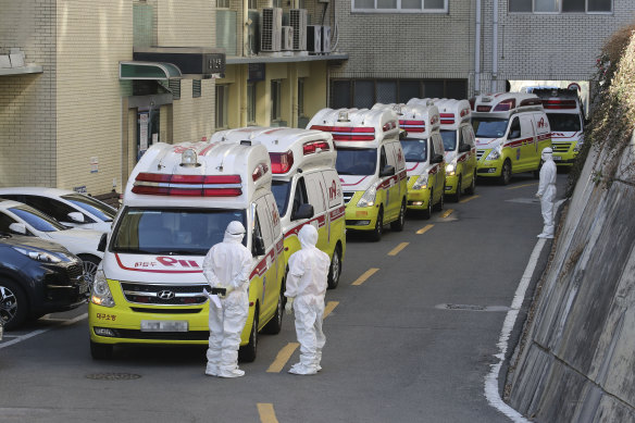 Ambulances carrying coronavirus patients arrive at a hospital in Daegu, South Korea on Sunday.