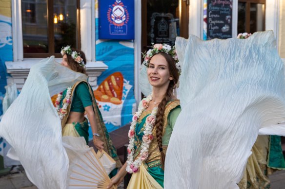 Folk artists perform on the street in Vladivostok. 