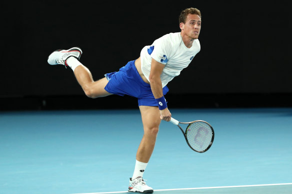 Roberto Carballes Baena of Spain serves in the round one match.