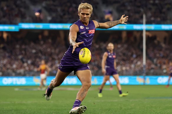 Quinton Narkle kicks the ball during the round 7 clash with the Adelaide Crows.