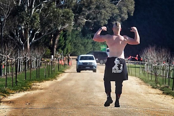 The participant of the Neo-Nazi meeting poses in a lane on Saturday.