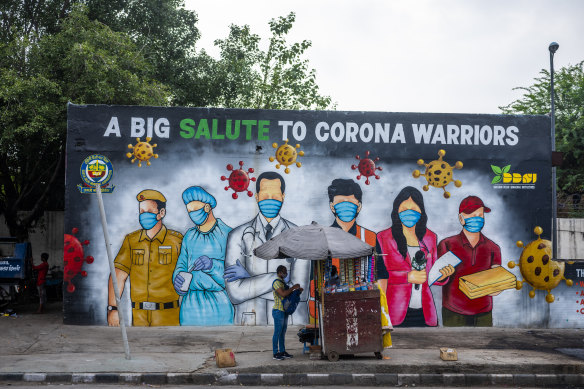 Front-line healthcare workers in India have been dubbed 'Corona Warriors'.