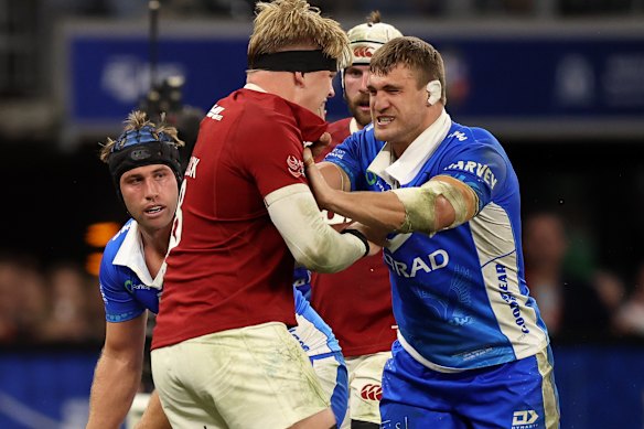 Henry Pollock and Nick Champion de Crespigny get into a shoving match.