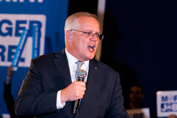 The great campaigner: Prime Minister Scott Morrison addresses a Liberal Party rally on Sunday. 