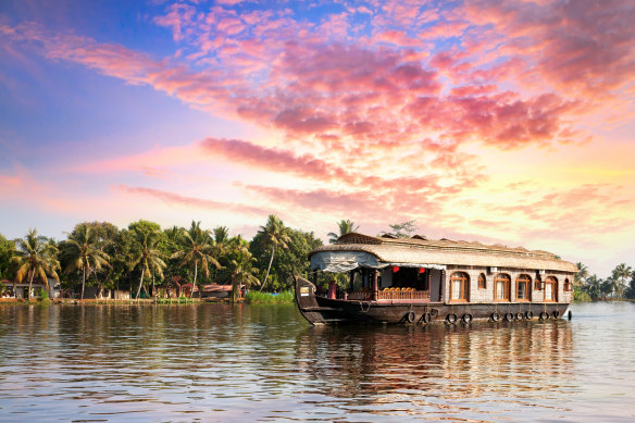 Explore the Kerala backwaters by houseboat. 