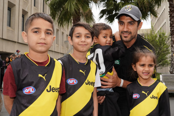 Grand final debutant Marlion Pickett with his children (from left): Marlion (9), Latrell (8), Levi (2), and Shaniqua (4).