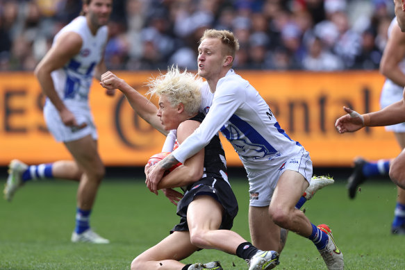 In the spotlight: Jack Ginnivan earned a high-contact free kick from this Jaidyn Stephenson tackle.