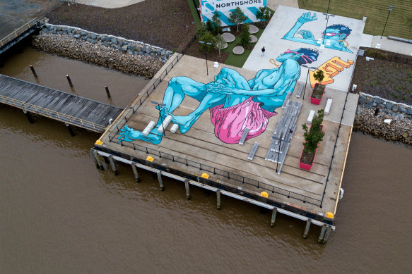 The massive mural Kitt Bennett painted on old wharves at Hamilton for the Brisbane Street Art Festival.