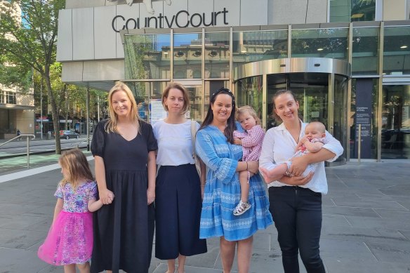 Stacey Harley, Ophi Mouton, Lauren Pedron and Peta Brunel protesting outside the County Court on Tuesday.