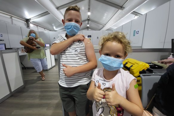 Max, 11, and Chloe Griffin, 6, children of infectious disease physician Paul Griffin, have their COVID vaccinations in Brisbane.