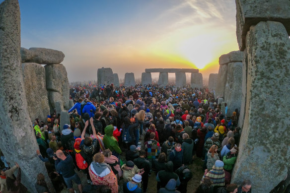 Thousands camped overnight so they could view the sunrise through the stones for the summer solstice. 