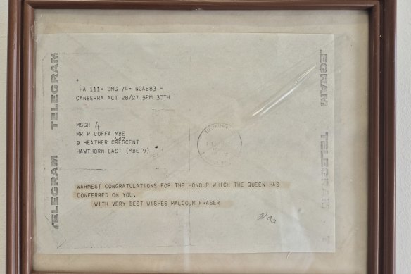 The 1983 telegram communication, signed by Queen Elizabeth II, notifying Coffa he had been awarded an MBE.