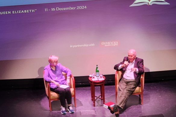 Sue Williams chats on stage with Alexander McCall Smith.