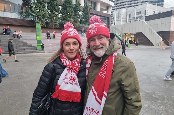 Wrexham fans Kylie Welbourne and Mark Glaubitz outside Marvel Stadium on Friday evening.