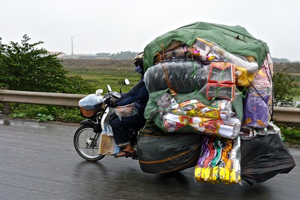 What the Vietnamese can carry on a motorbike is remarkable. 