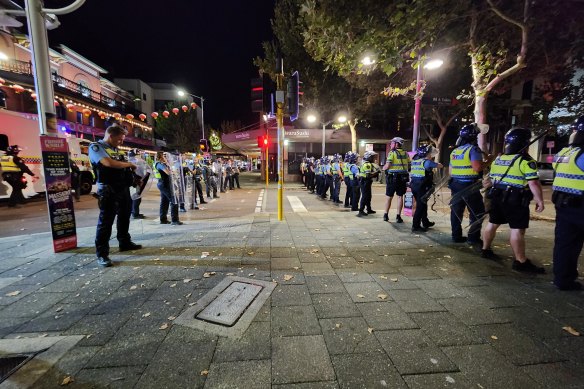 Police in Northbridge work to disperse crowds on Australia Day.