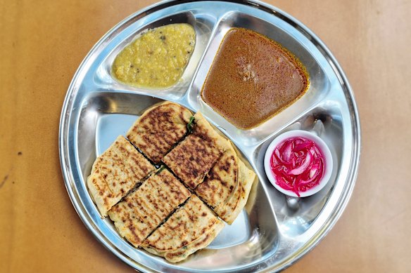 Roti with dhal and curry sauce.