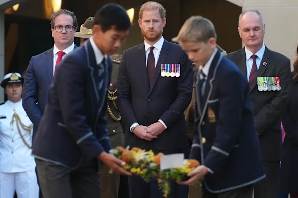 Prince Harry, Duke of Sussex, observes wreath laying during the Last Post Ceremony.