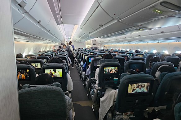 Economy seats are in a 3-3-3 layout.