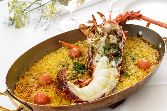 Melbourne restaurant Gimlet’s half southern rock lobster, roasted in a wood oven and served on saffron rice with a bisque sauce. About 40 people order the $170 dish each day.