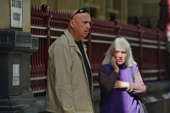 Teresa Moraitis and her nephew Jim Moraitis attend a hearing at the Supreme Court.