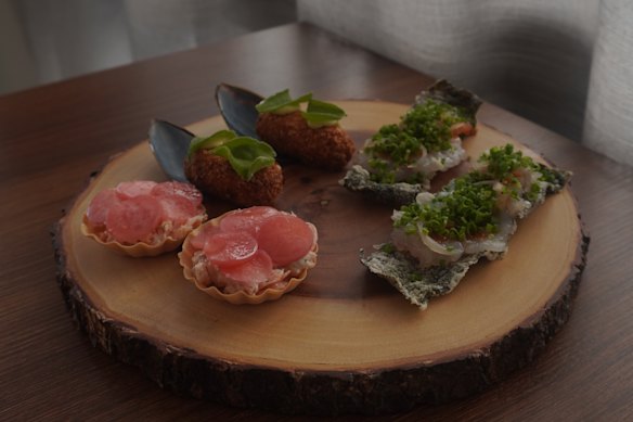Snacks: Rainbow trout rillettes tartlet; Portarlington mussel croquettes; and raw prawn on seaweed crisps.