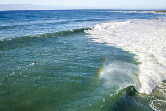 Surfers take on the swell at Skennars Head, north of Ballina, on Tuesday.