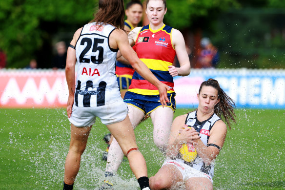 Footy or swim? Chloe Molloy in action.