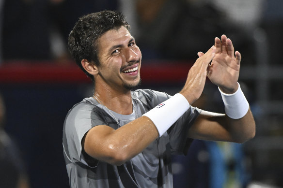 Alexei Popyrin is all smiles after winning the Montreal Masters.