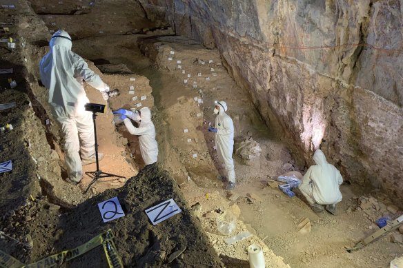 Researchers take samples from different cultural layers in a cave in Zacatecas, central Mexico. 