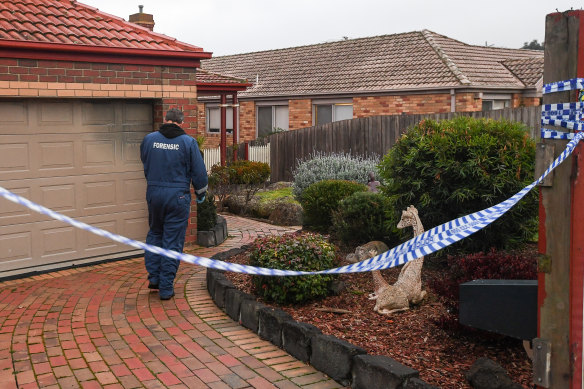 Police at Elaine Pandilovski’s home on the day after her body was discovered.
