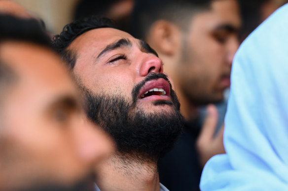 A man cries during a funeral service for Egyptian soldier Abdullah Ramadan Ashri Qutb Hajji killed earlier this week near the Rafah crossing between Egypt and Gaza.