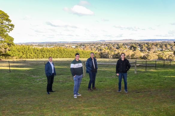 Macedon Ranges councillor Dominic Bonanno (left) and Riddells Creek residents Simon Were, Ross Colliver and Aaron Goldsworthy at the site of the proposed development.