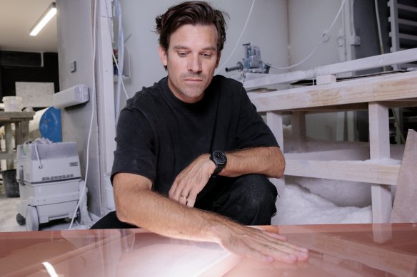 Hayden Cox in his Mona Vale workshop working on the resin pieces for his furniture collection for Australian luxury brand SP01.