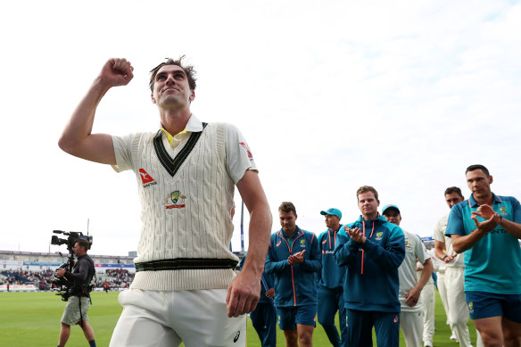Pat Cummins leads his troops from the field after a remarkable Test victory.