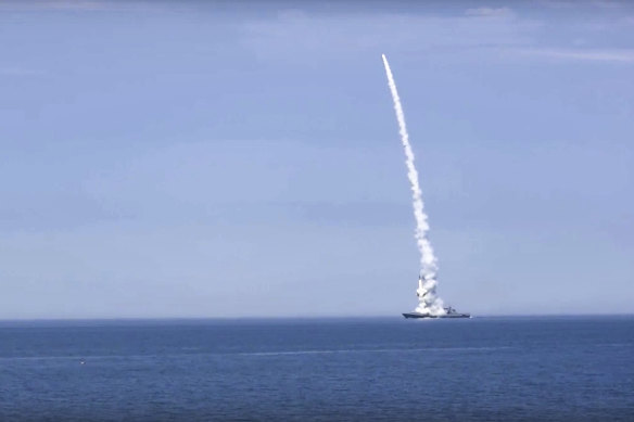 A Russian warship launches a cruise missile at a target in Ukraine.