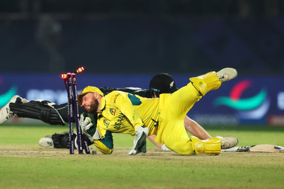 Australian wicketkeeper Marnus Labuschagne runs out Jimmy Neesham after a late cameo for New Zealand.