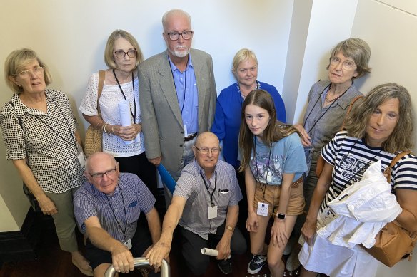 Some of the Norman Park residents - including spokespersons Mark Stanton and Katy Briggs (standing centre) continue to argue to keep their ferry service from Norman Park to New Farm.