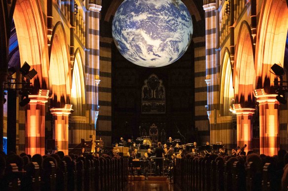 Under the Earth: MSO chorus performs under a new artwork at St Paul’s.